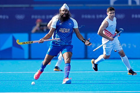 India's Jarmanpreet Singh reacts during the match against Belgium